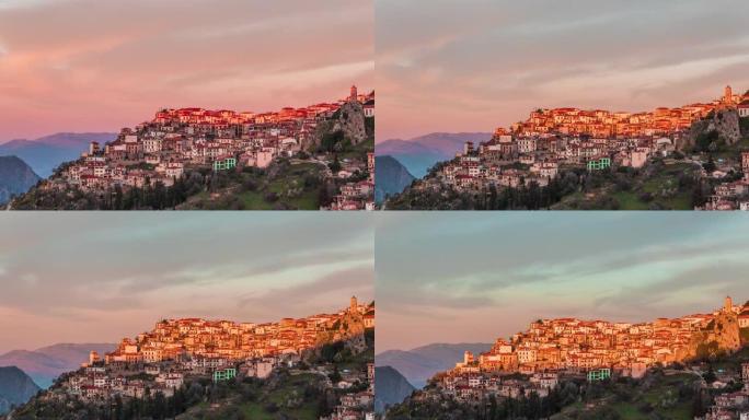 希腊阿拉科瓦镇的日出。时间流逝显示了太阳如何升起并逐渐照亮城市的房屋。