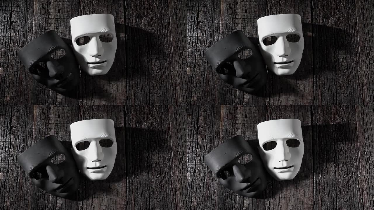 木制复古背景上的黑白面具，匿名和剧院的象征。带阴影特写，复制空间