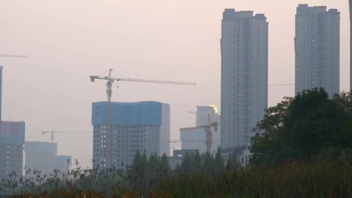 日落时间长沙市公寓综合体建设慢动作全景4k中国
