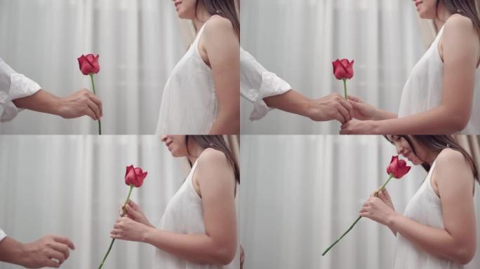 女人收到一朵红玫瑰花带爱