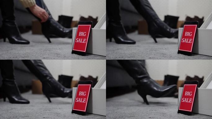 女人在大甩卖上试鞋。