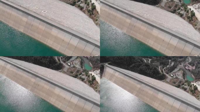 水电大坝，空中俯视图。水坝和水库湖产生的水力发电。全球变暖。可持续水电