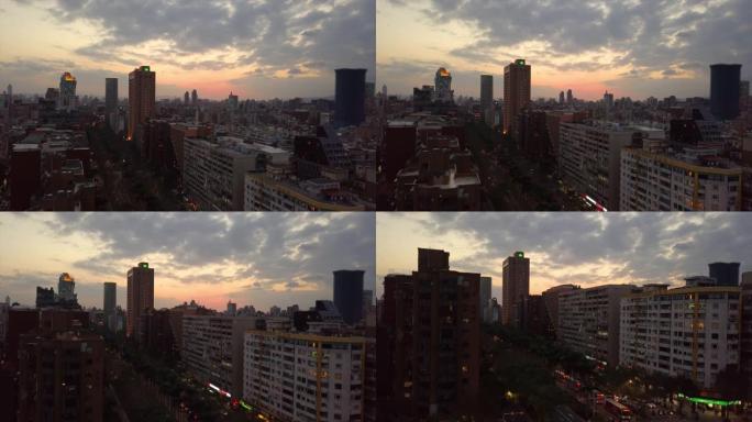 台湾日落天空之夜照明台北城市景观高空中全景4k