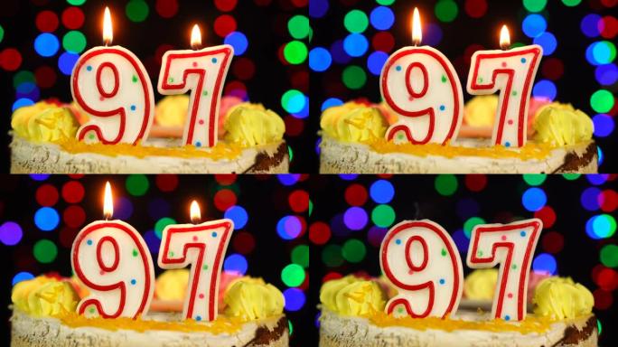97号生日快乐蛋糕Witg燃烧蜡烛礼帽。