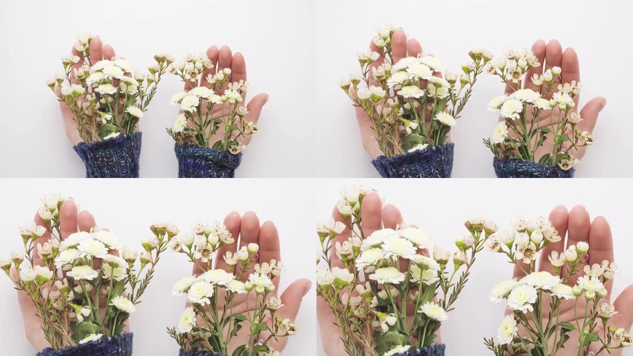 手掌上的花越来越多。花卉视频合成。