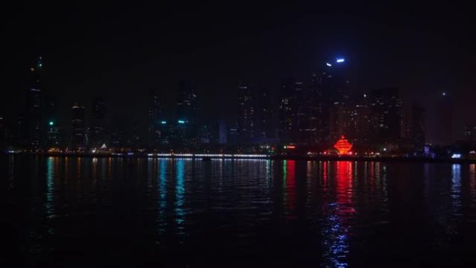 夜间照明青岛市著名的现代市中心海湾全景4k中国