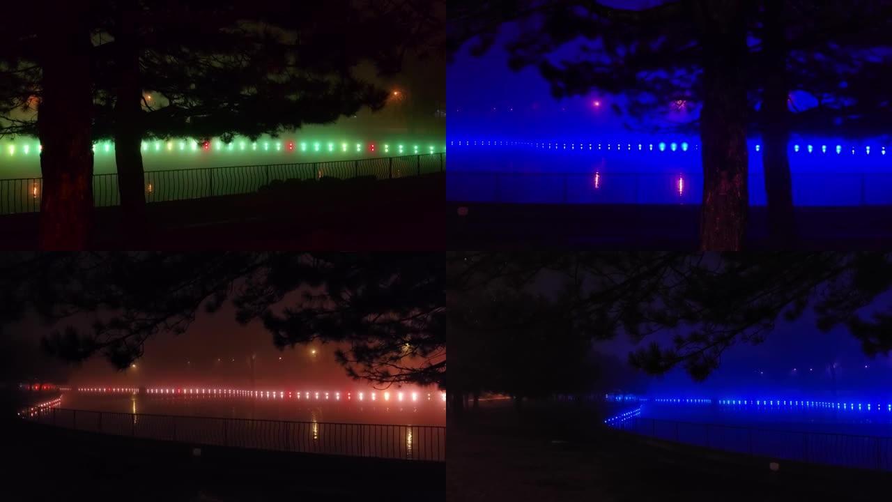 雾夜池塘的神奇彩色照明