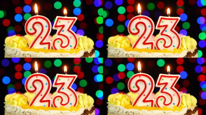 23号生日快乐蛋糕Witg燃烧蜡烛礼帽。