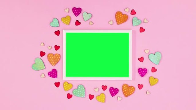 爱与心与绿屏框架。停止运动