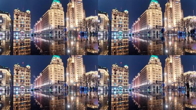 雨天上海外滩景观的4k延时镜头，夜间驾驶车灯完美反映历史建筑地标。