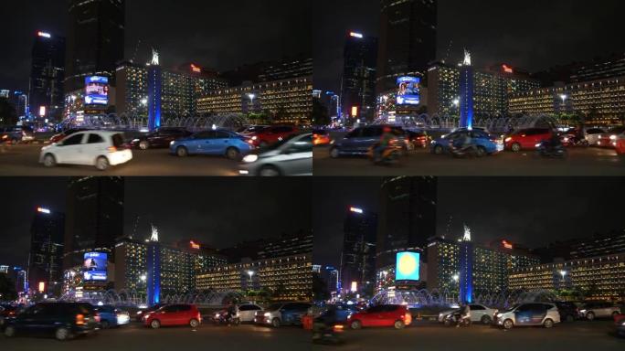 夜照雅加达市市中心著名交通街圆形喷泉全景4k印度尼西亚