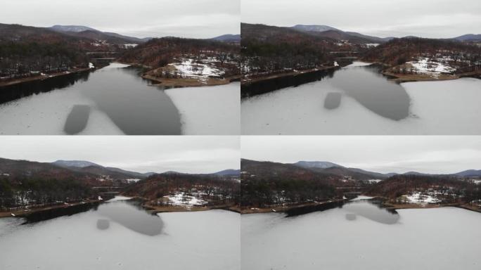 冬季冰冻湖泊表面的美丽照片。无人机飞越雪山和山湖，冬季景观，森林，塞尔维亚，博尔，自然，户外