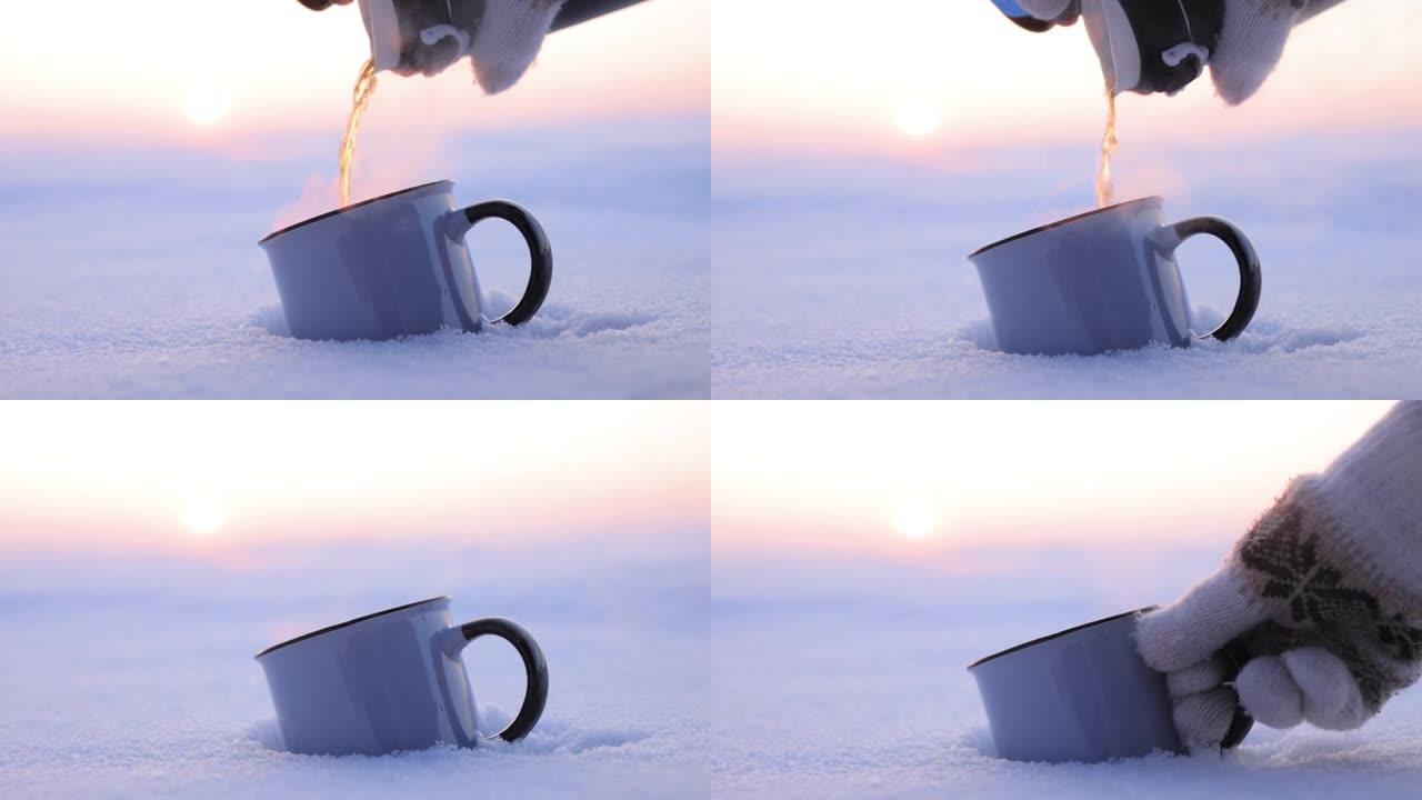 在寒冷的冬天，将热水瓶中的茶倒入杯子中