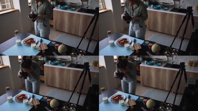 女美食摄影师为她的美食博客拍照