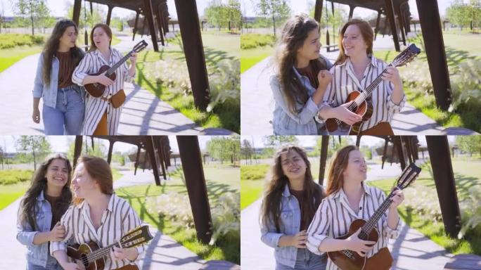 女人拥抱朋友在当代城市公园玩尤克里里琴