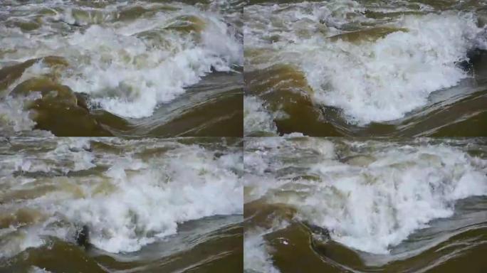 汹涌的河水，眩晕的水流，大雨后旋转的泡沫水波，奥地利穆尔河的混浊急流