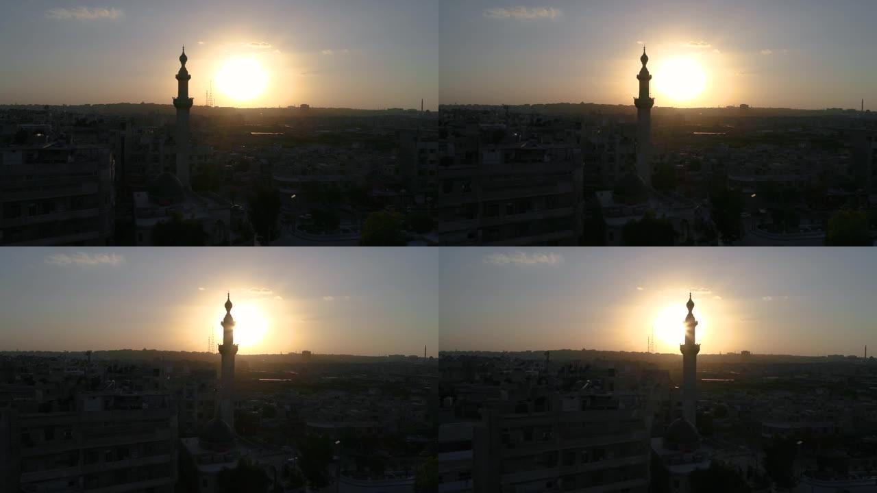 日落下的叙利亚清真寺。我们可以在4K的地平线上看到阿勒颇市
