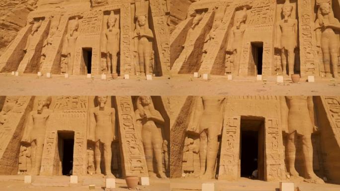 走到nefertari神庙里面的门旁边的阿布辛贝神庙在埃及南部努比亚靠近纳赛尔湖。拉美西斯二世法老庙