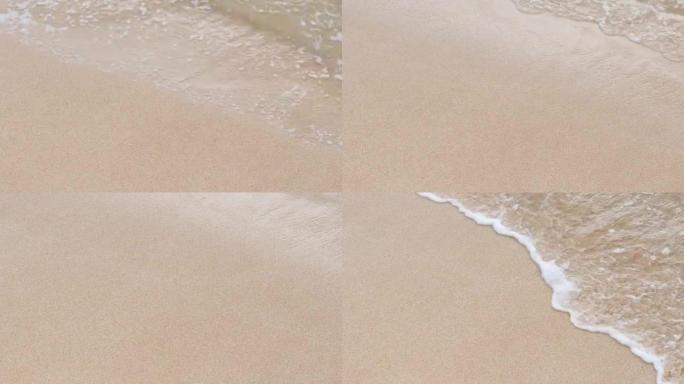 刷软波的白色细沙的特写视图。