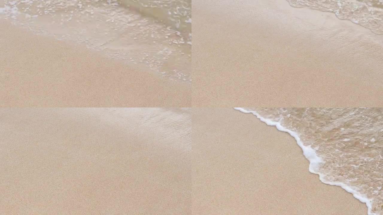 刷软波的白色细沙的特写视图。