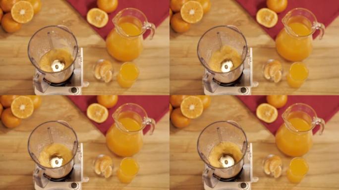 将新鲜橙汁制成开放式榨汁机混合罐-健康有机饮食