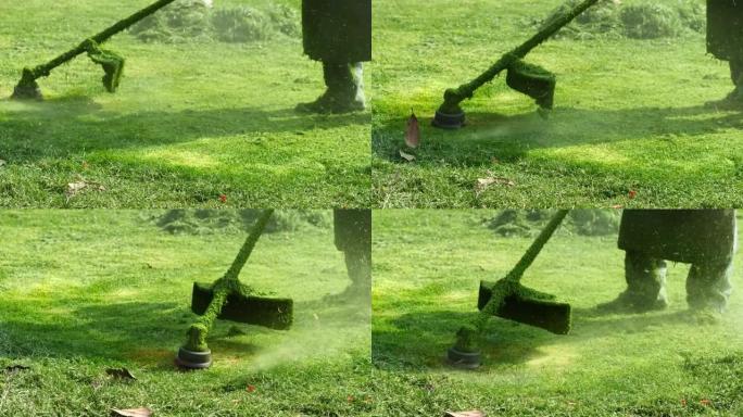 用割草机关闭割草和割草的4k镜头，慢动作。