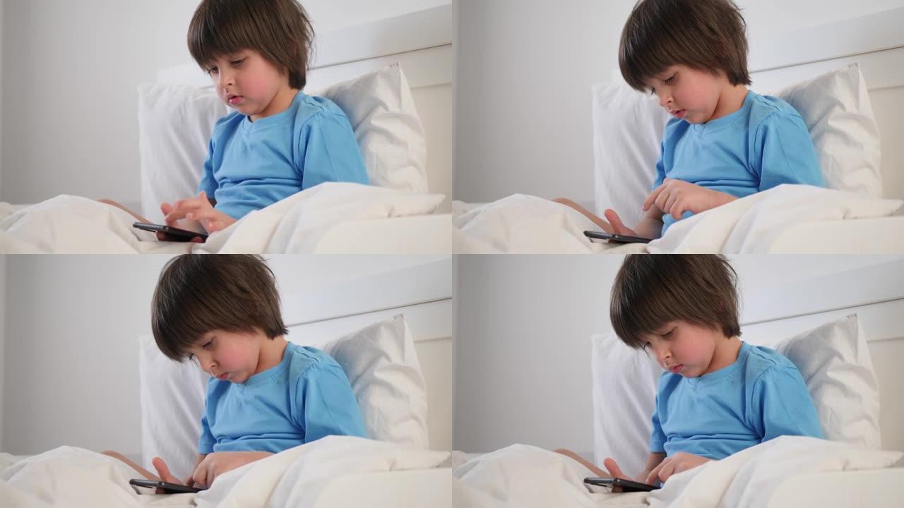 男孩，孩子，床上玩手机，毯子受罪