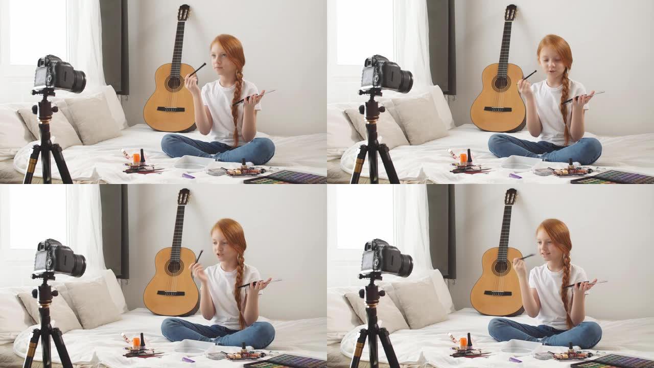 少年的小博主画像，一个孩子有兴趣讲述化妆品，一个红头发的迷人女孩坐在镜头前录制视频教程