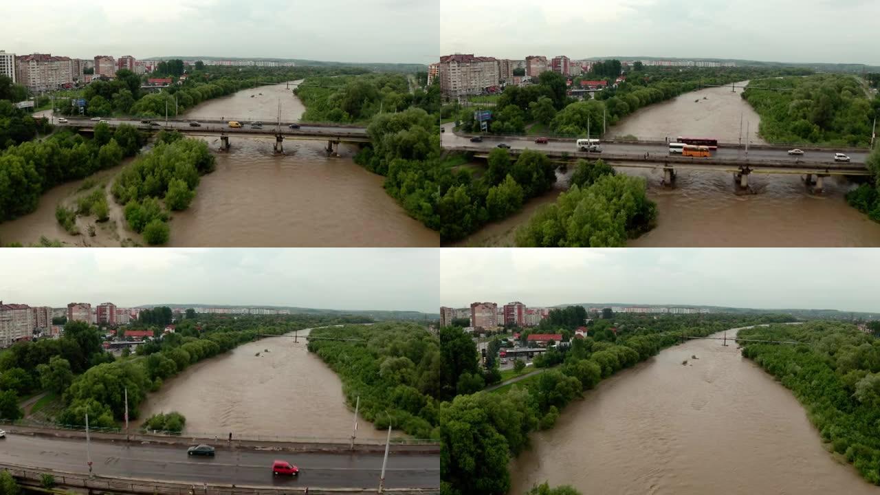 空中无人机视图。大雨过后，桥梁和河水又大又脏。宽视图Vercion 2