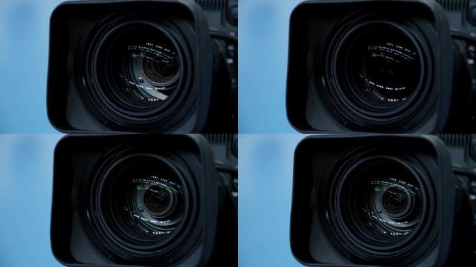 数码相机的聚焦镜头。相机的镜头。特写。相机对焦和拍摄。摄影或电影摄制设备的专业服务概念。