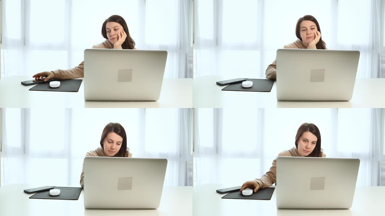 女自由职业者编码员对笔记本电脑感到厌烦