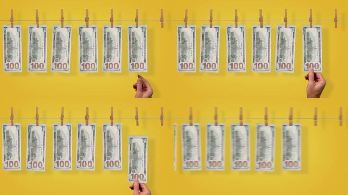 100美元的洗钱线输送机，黄色背景上的100美元钞票的背面