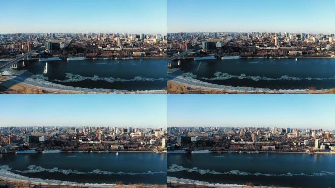 无人机在唐河上的全景飞行，可以看到顿河畔罗斯托夫市右岸有许多建筑，俄罗斯大城市在冬季鸟瞰图