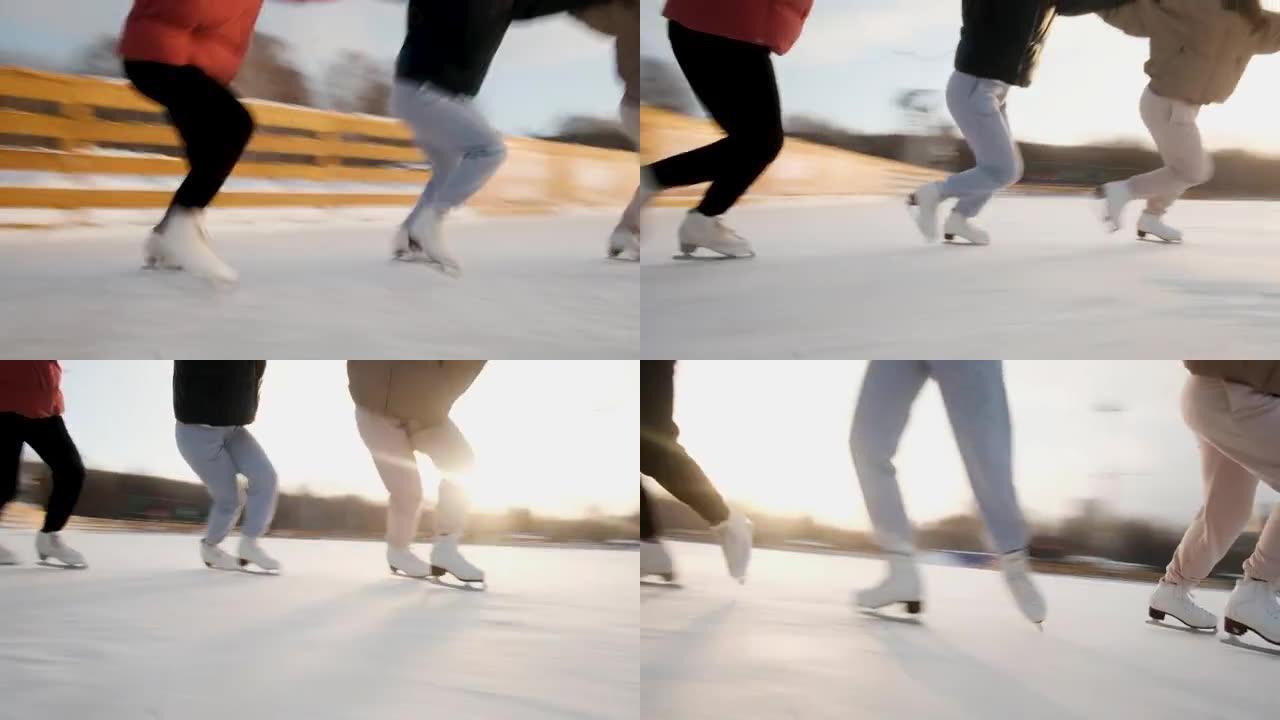 女子滑冰运动员正在滑冰。执行组号。滚成一圈。溜冰场阳光明媚的周末。冬季运动。积极的生活方式概念。女性