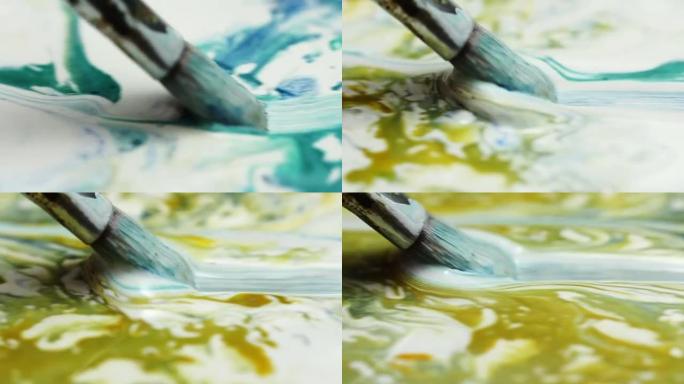 在luqiud中从侧面滑动的刷子在白色上混合在一起。绘画背景