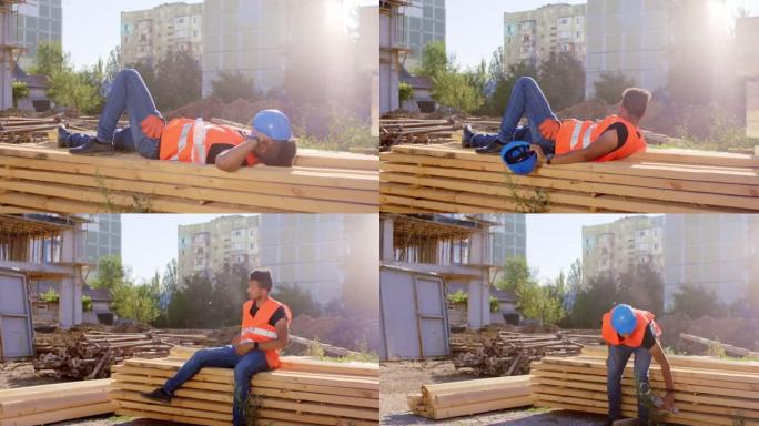 在一个建筑工地，美国黑人在休息时间在外面的树林里小睡一会儿，他醒来时戴上安全帽去上班