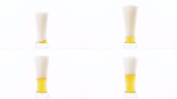 特写镜头将啤酒倒入白色背景的杯子中