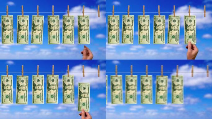 20美元的洗钱线输送机，20美元钞票的正面，背景为天空