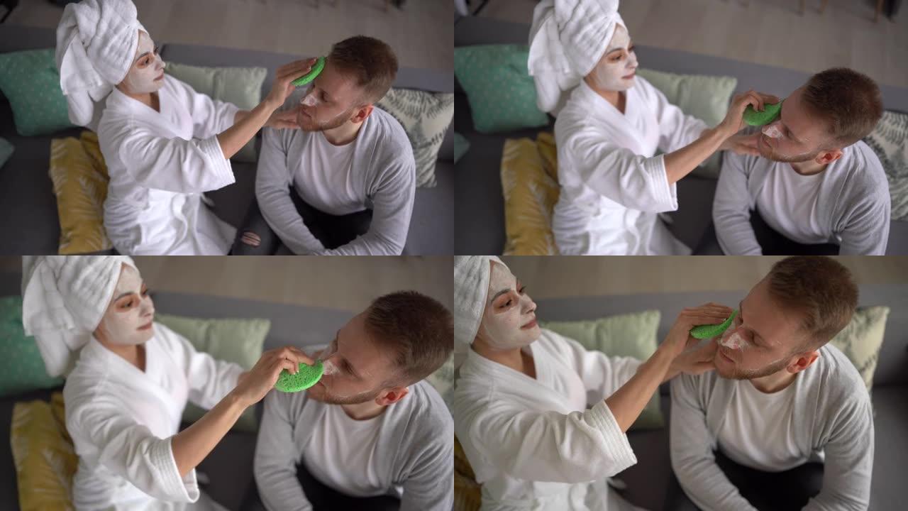 女人在家用奶油清洁男人的脸