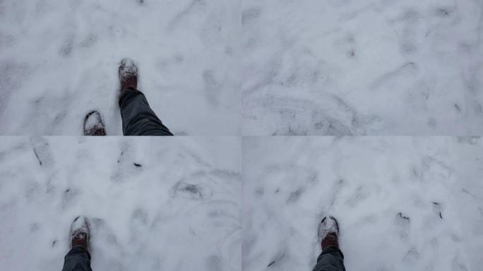 POV脚在慢动作中被雪踩着