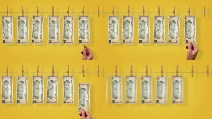 10美元的洗钱线输送机，黄色背景上10美元钞票的背面