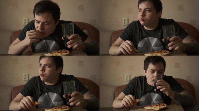 一个穿着黑色t恤的年轻人吃着美味的披萨，手里拿着一个装有苏打水的杯子。
