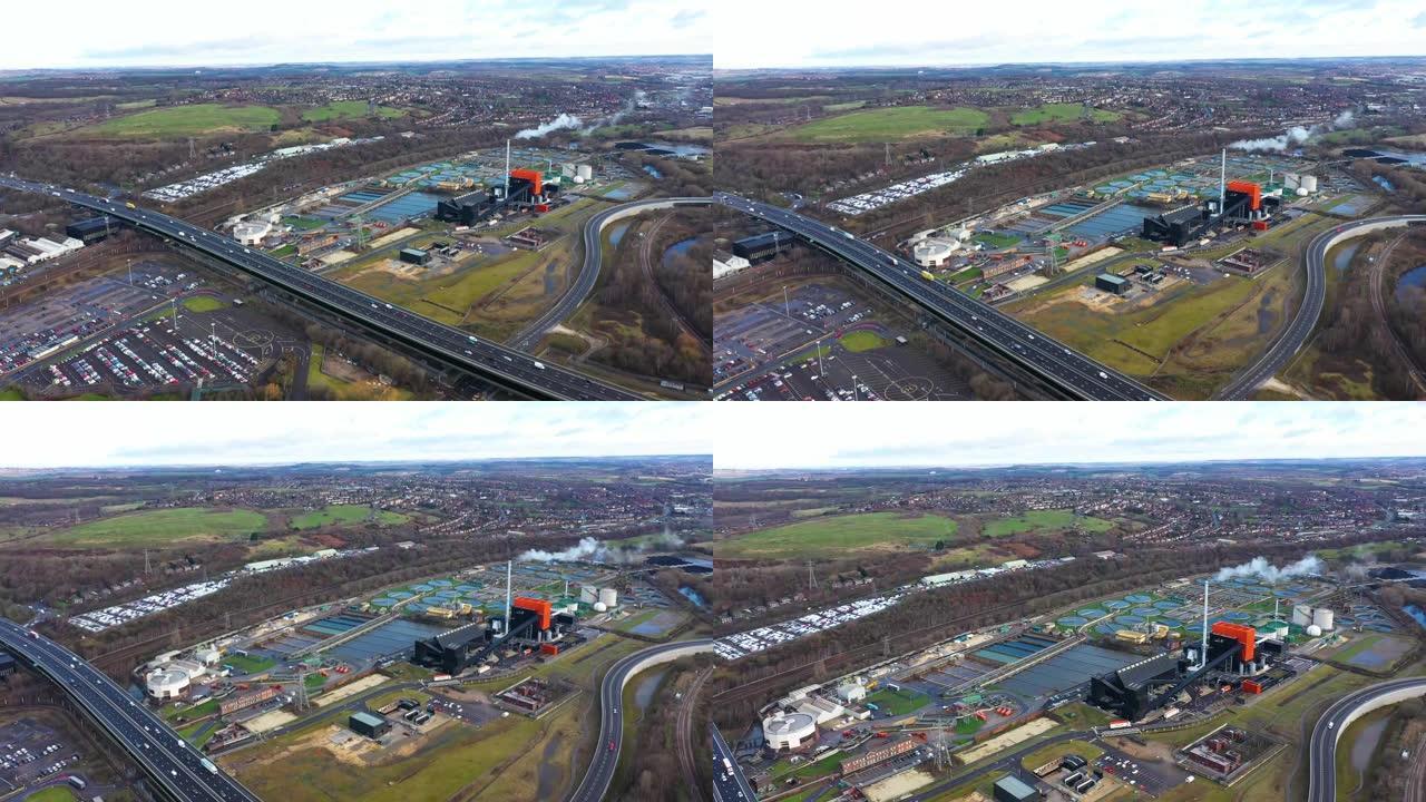 位于英国谢菲尔德的污水处理厂和高速公路沿M1高速公路的航拍画面显示了回收分离水箱