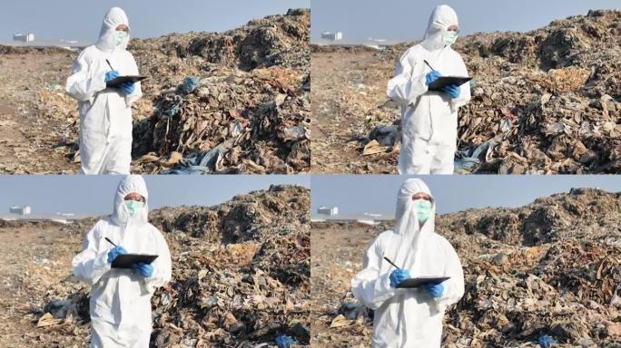 研究人员正在研究垃圾堆的影响。回收，垃圾，塑料，环境，清洁，