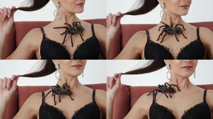 女人胸前的大黑蜘蛛。特写