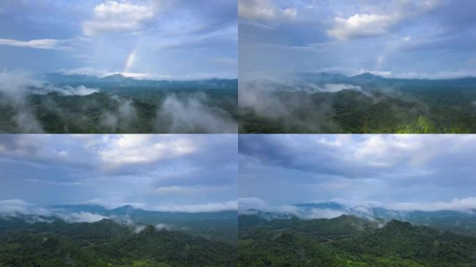 森林雨后，超级失误4k惊人的彩虹。云时间流逝。山景，山中彩虹和戏剧性的云层。