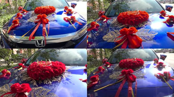 蓝色汽车上的红色鲜花主婚车