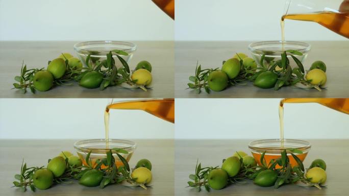 将正宗的，纯净的有机摩洛哥坚果油倒入玻璃碗中。