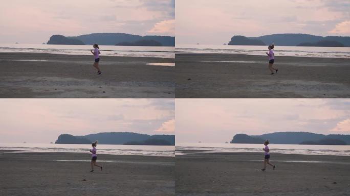 在海边慢跑的女人海滩海岸奔跑