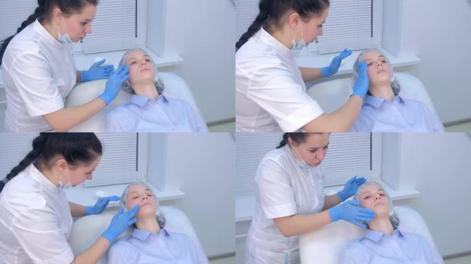 美容师在脸上注射生物evitalization后使用愈合霜。